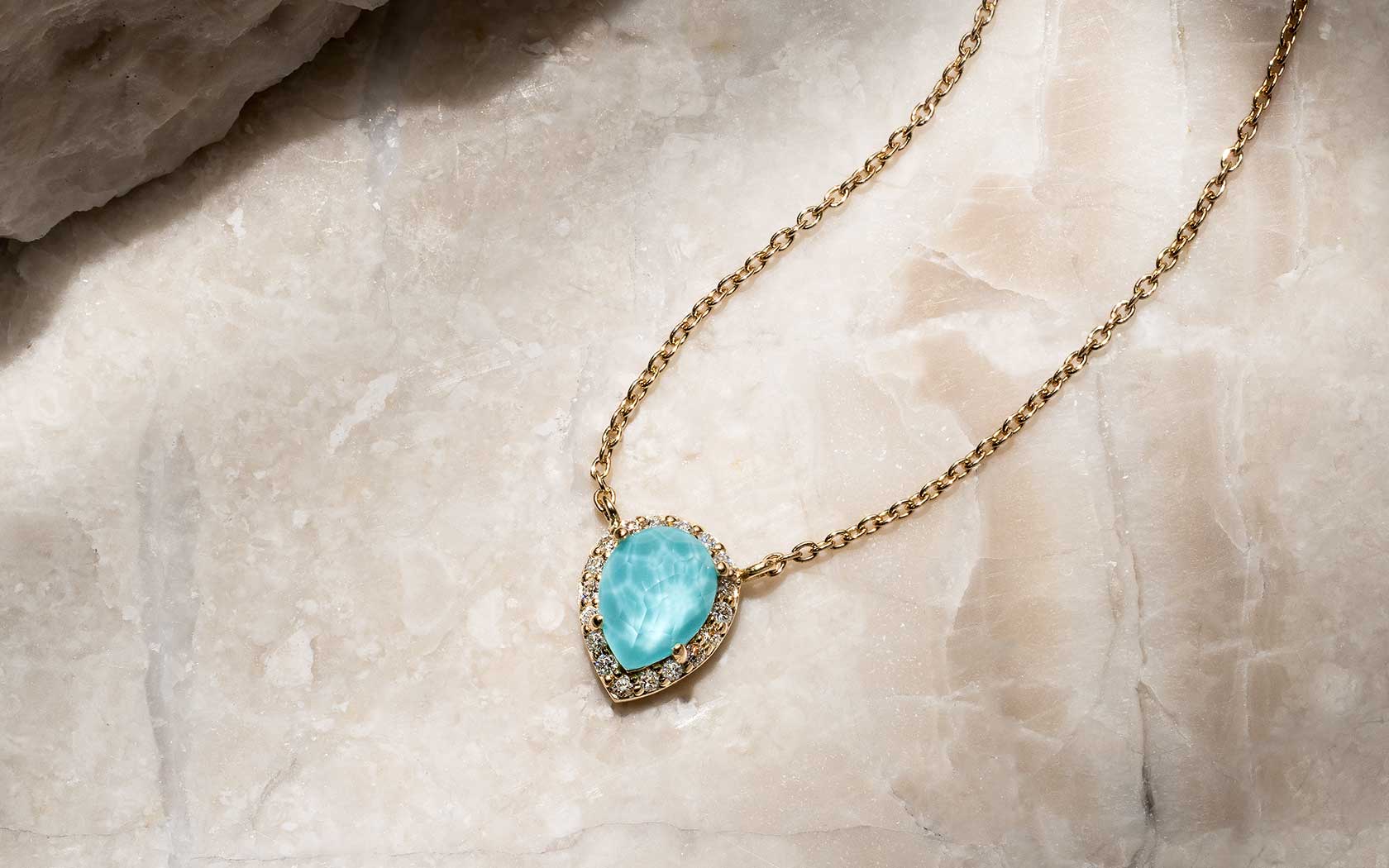 14k gold Laguna Key pieces — warm metal with faceted color