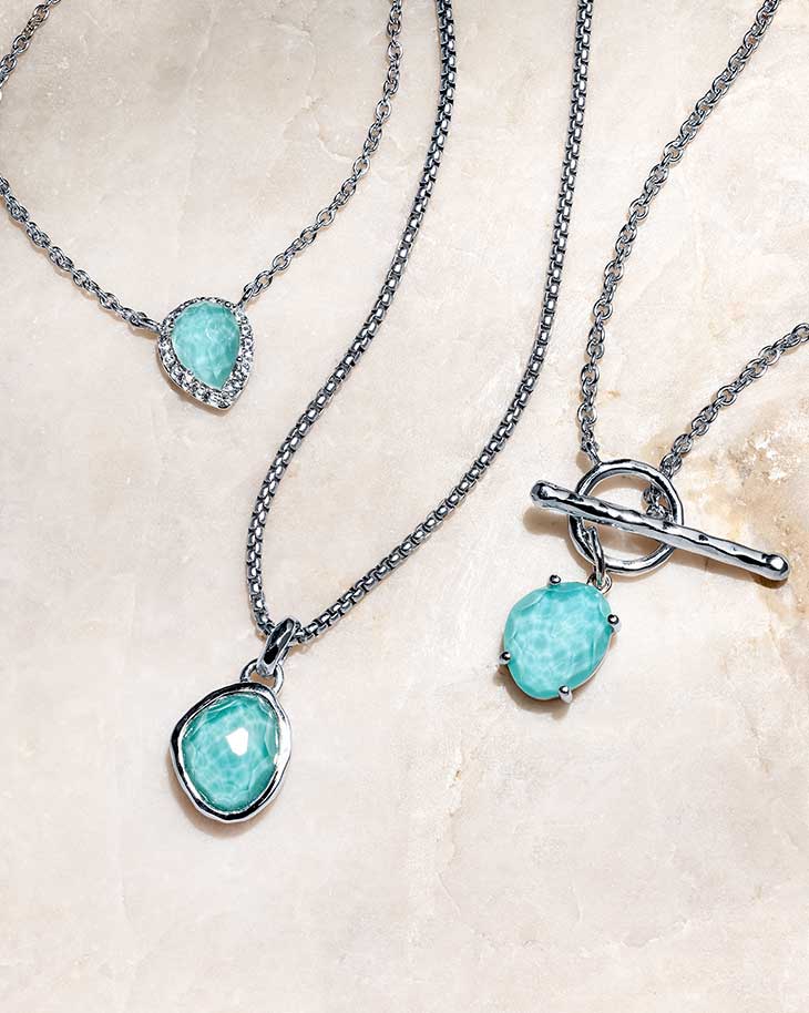 Laguna Key necklaces — layered chains, charm necklaces, statement pieces