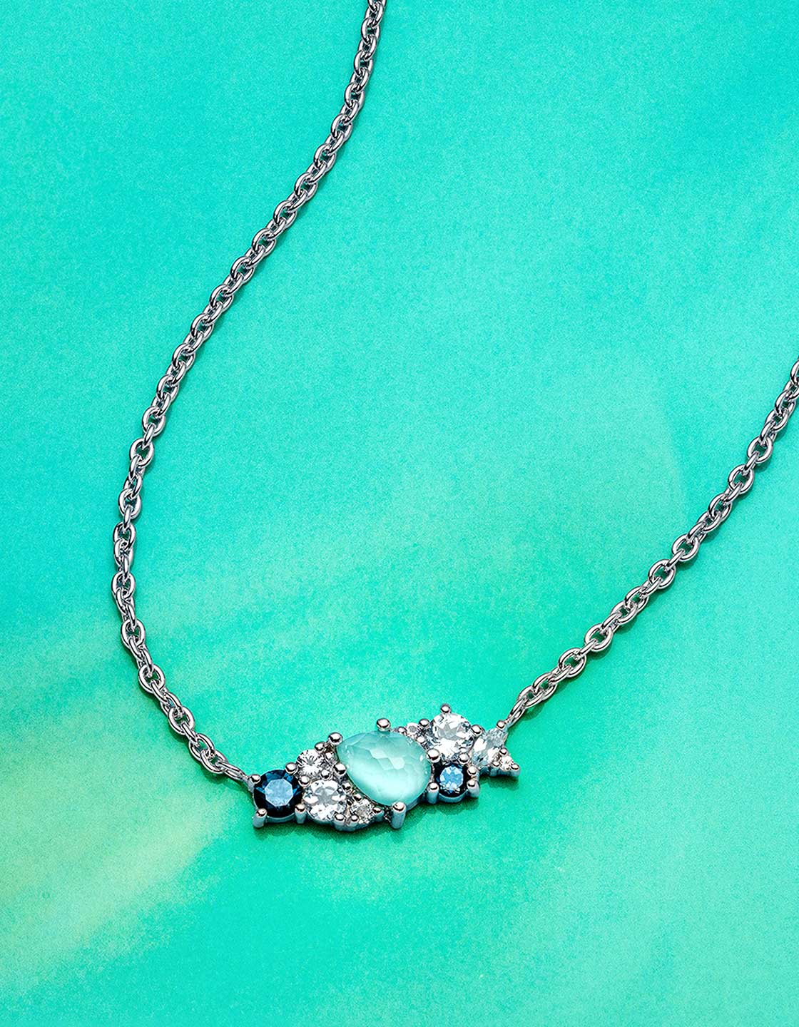 Laguna Key natural stones, Mother of Pearl, and diamond accents