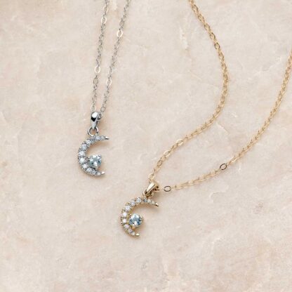 Crescent Moon Aquamarine and Diamond Necklace on Stone