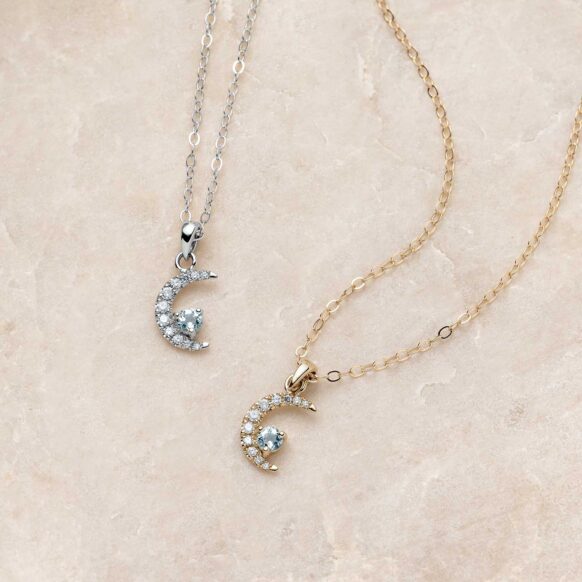 Crescent Moon Aquamarine and Diamond Necklace on Stone